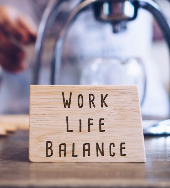 Work life balance quote on wooden sign board background.