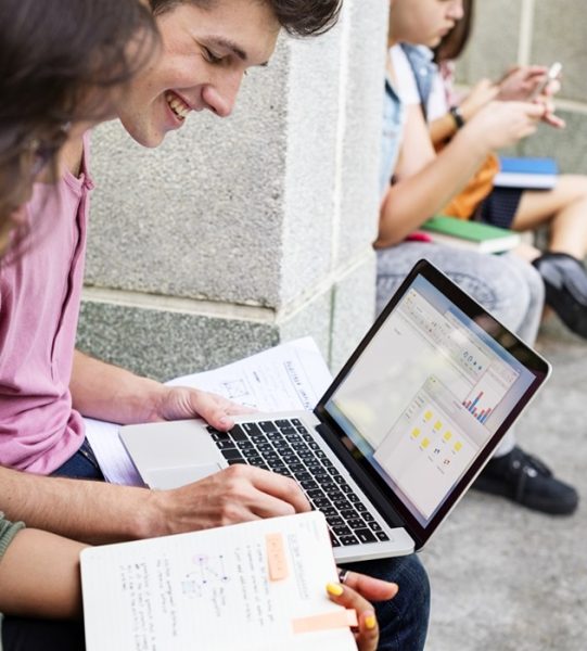 Students doing homework in the park