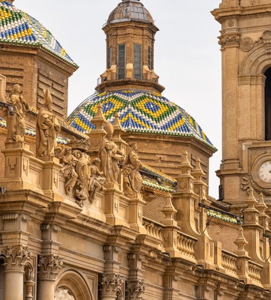 Decoration of statues and other ornaments on the main facade of the Pilar Cathedral, Zaragoza, Spain